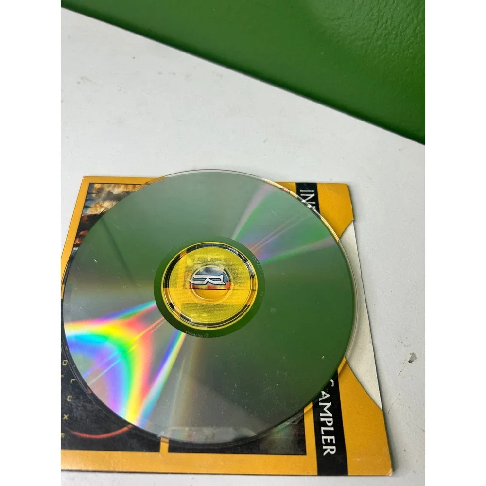 Infogrames Action Sampler PC CD-ROM 1999 Silver Slave Zero Outcast Demo Disc